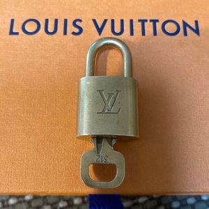 Authentic Louis Vuitton padlock and key #312